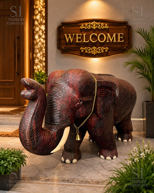 Grand Hand-Carved Rosewood Welcome Elephant with Brass Chain - Image 1